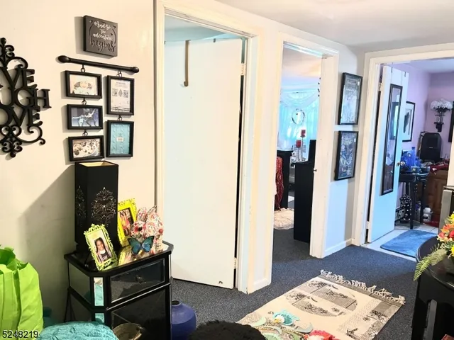 a bedroom with bed and walk in closet