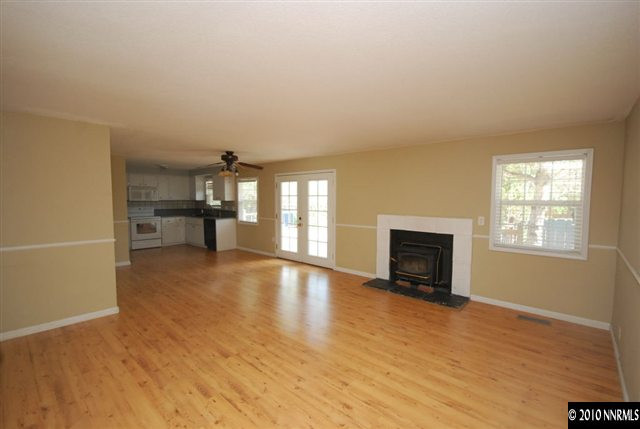 158 Ring Road Dayton, NV 89403 - Photo 2 of 9 a view of livingroom with furniture and fireplace