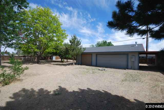 158 Ring Road Dayton, NV 89403 - Photo 7 of 9 a house with trees in front of it