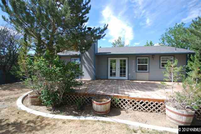 158 Ring Road Dayton, NV 89403 - Photo 9 of 9 a view of a house with backyard sitting area and garden