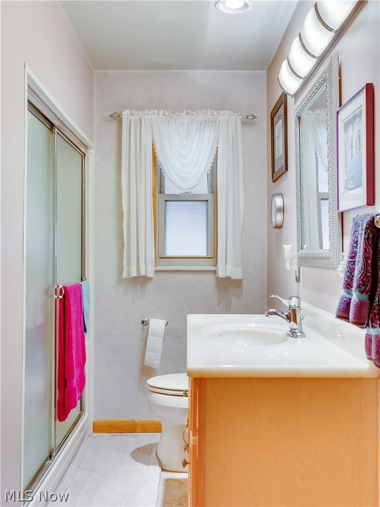 7189 Maplewood Road Parma, OH 44130 - Photo 13 of 20 Main bathroom with a walk in shower for your convenience.