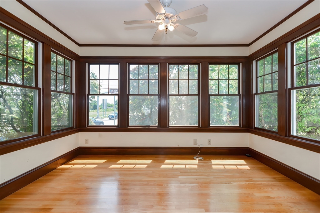 2 Prospect Street Milford, MA 01757 - Photo 15 of 31 a view of empty room with wooden floor and fan