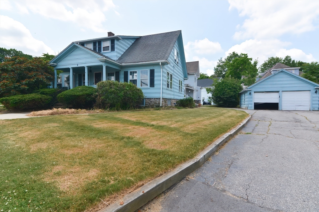 2 Prospect Street Milford, MA 01757 - Photo 2 of 31 a view of a house with a yard