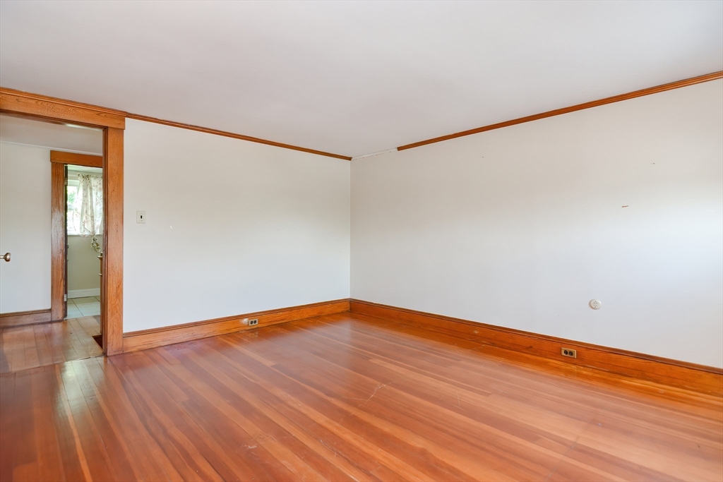 2 Prospect Street Milford, MA 01757 - Photo 26 of 31 wooden floor in an empty room with a window