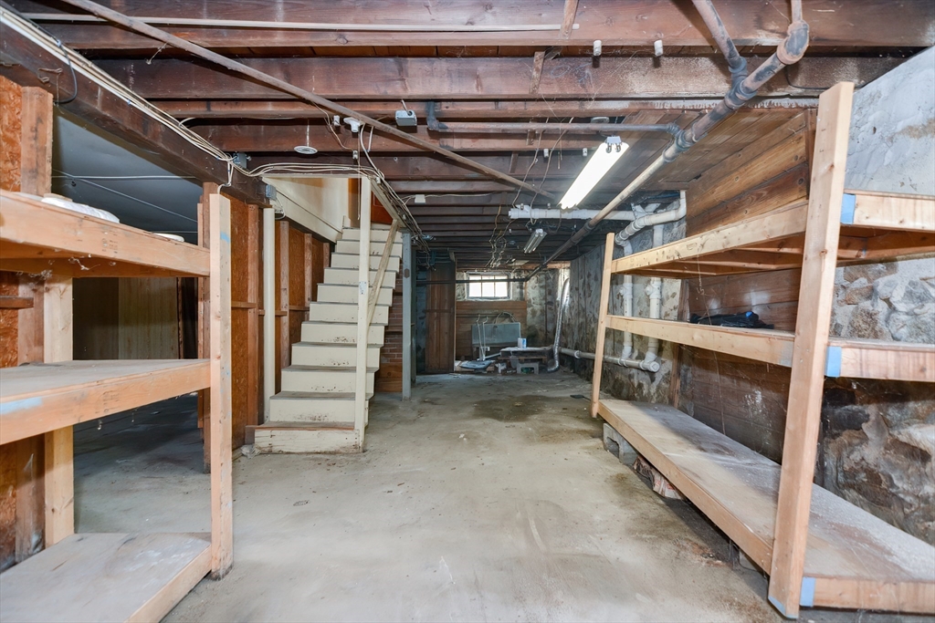 2 Prospect Street Milford, MA 01757 - Photo 30 of 31 a view of an empty room with wooden ceiling