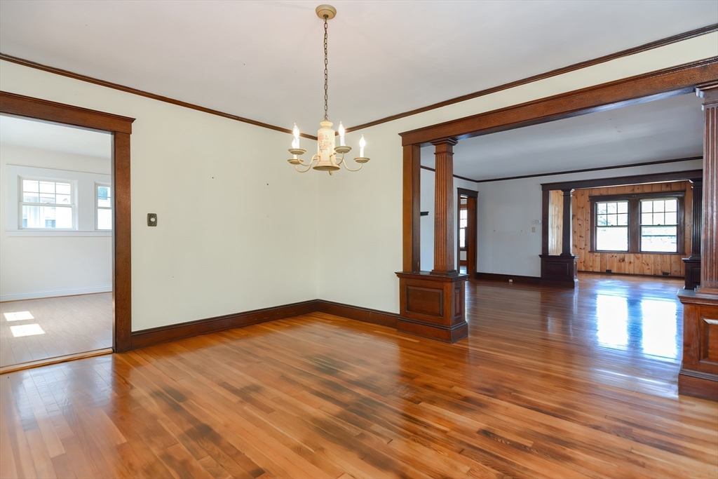 2 Prospect Street Milford, MA 01757 - Photo 8 of 31 a view of a livingroom with wooden floor and staircase