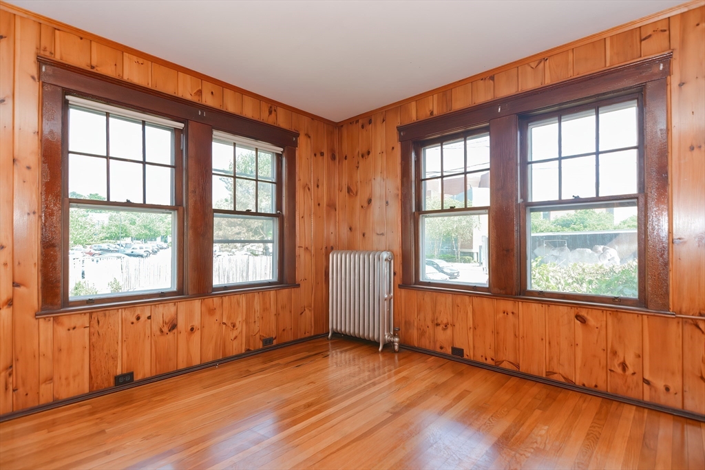 2 Prospect Street Milford, MA 01757 - Photo 10 of 31 an empty room with wooden floor and windows