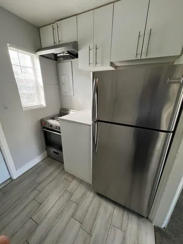 a utility room with closet dryer and washer