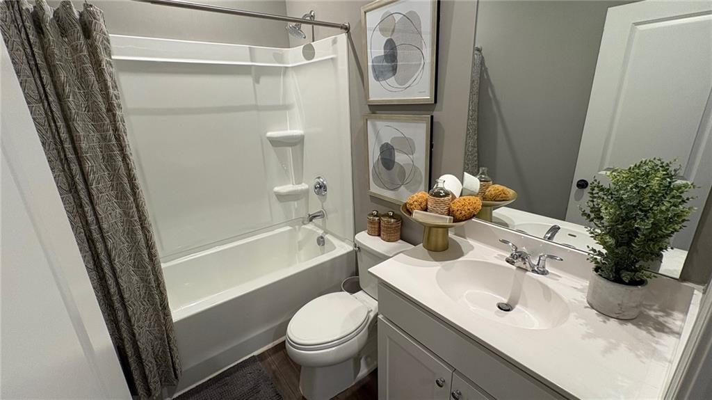 600 Tiller Way Acworth, GA 30102 - Photo 16 of 23 a bathroom with a sink toilet and shower