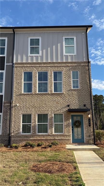 600 Tiller Way Acworth, GA 30102 - Photo 2 of 23 a front view of a house with yard