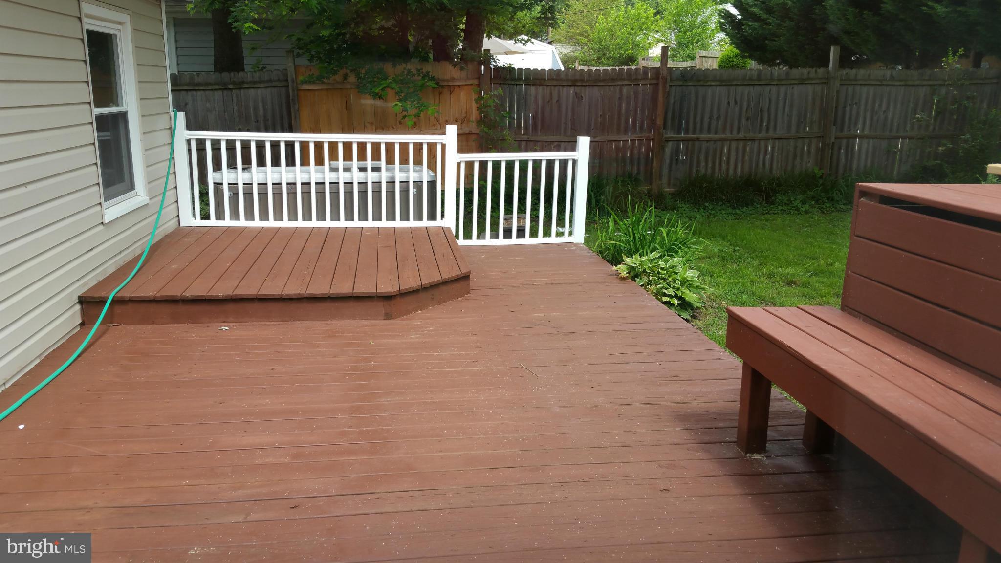 12408 Starlight Lane Bowie, MD 20715 - Photo 11 of 26 a view of a deck with a yard