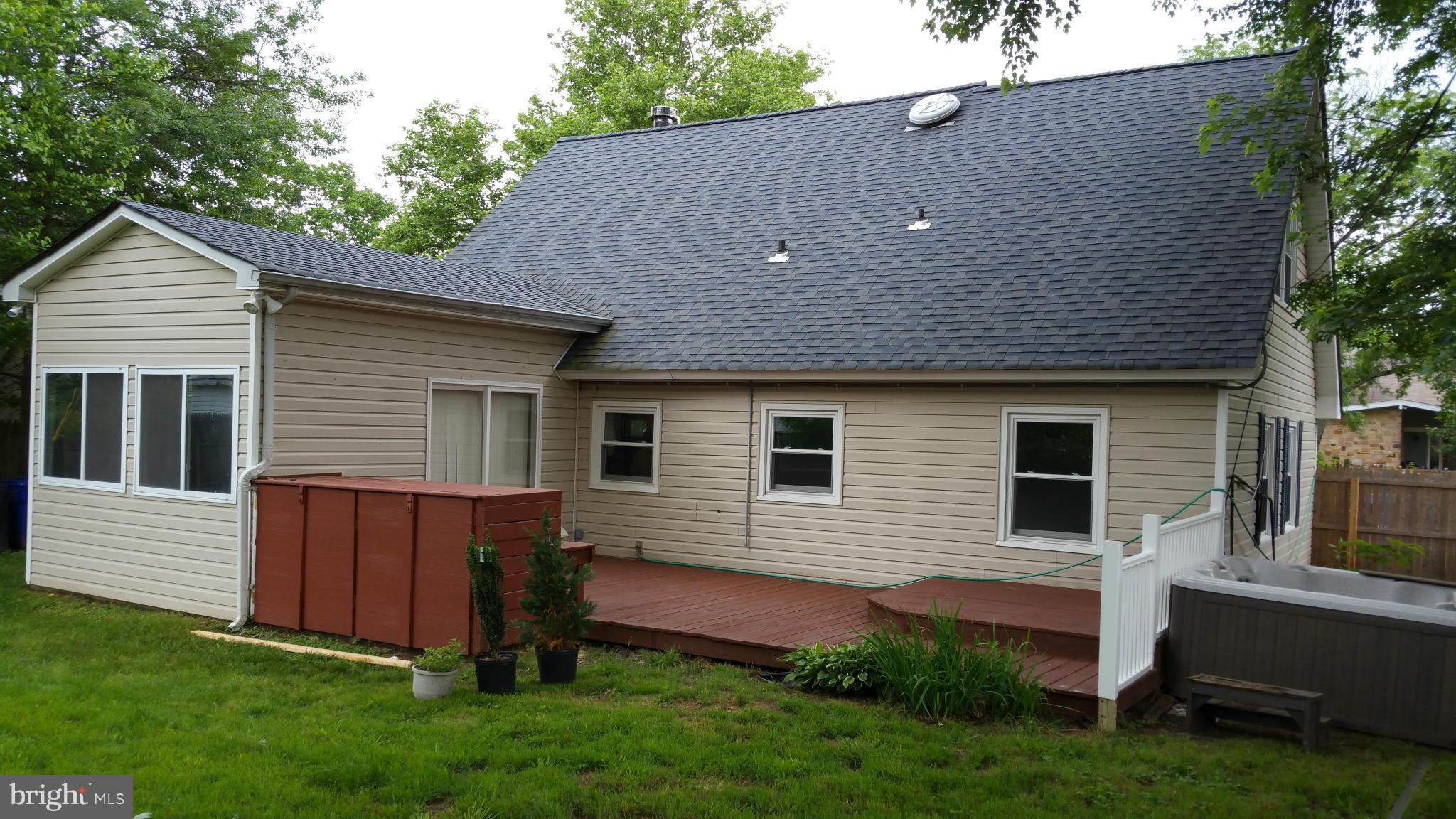 12408 Starlight Lane Bowie, MD 20715 - Photo 12 of 26 a backyard of a house with lots of green space