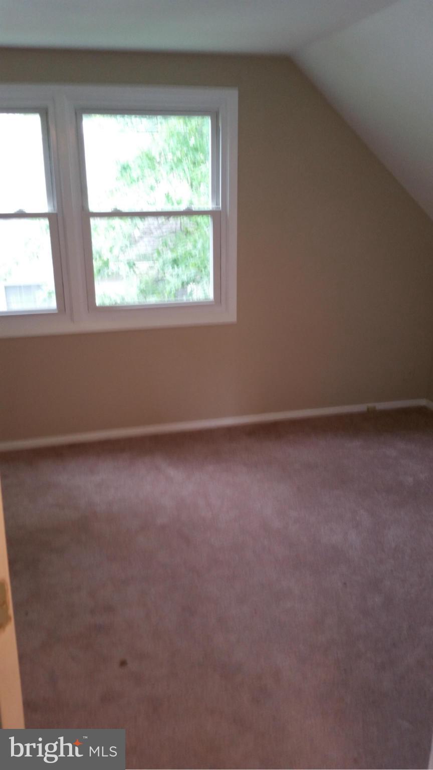 12408 Starlight Lane Bowie, MD 20715 - Photo 20 of 26 an empty room with a window
