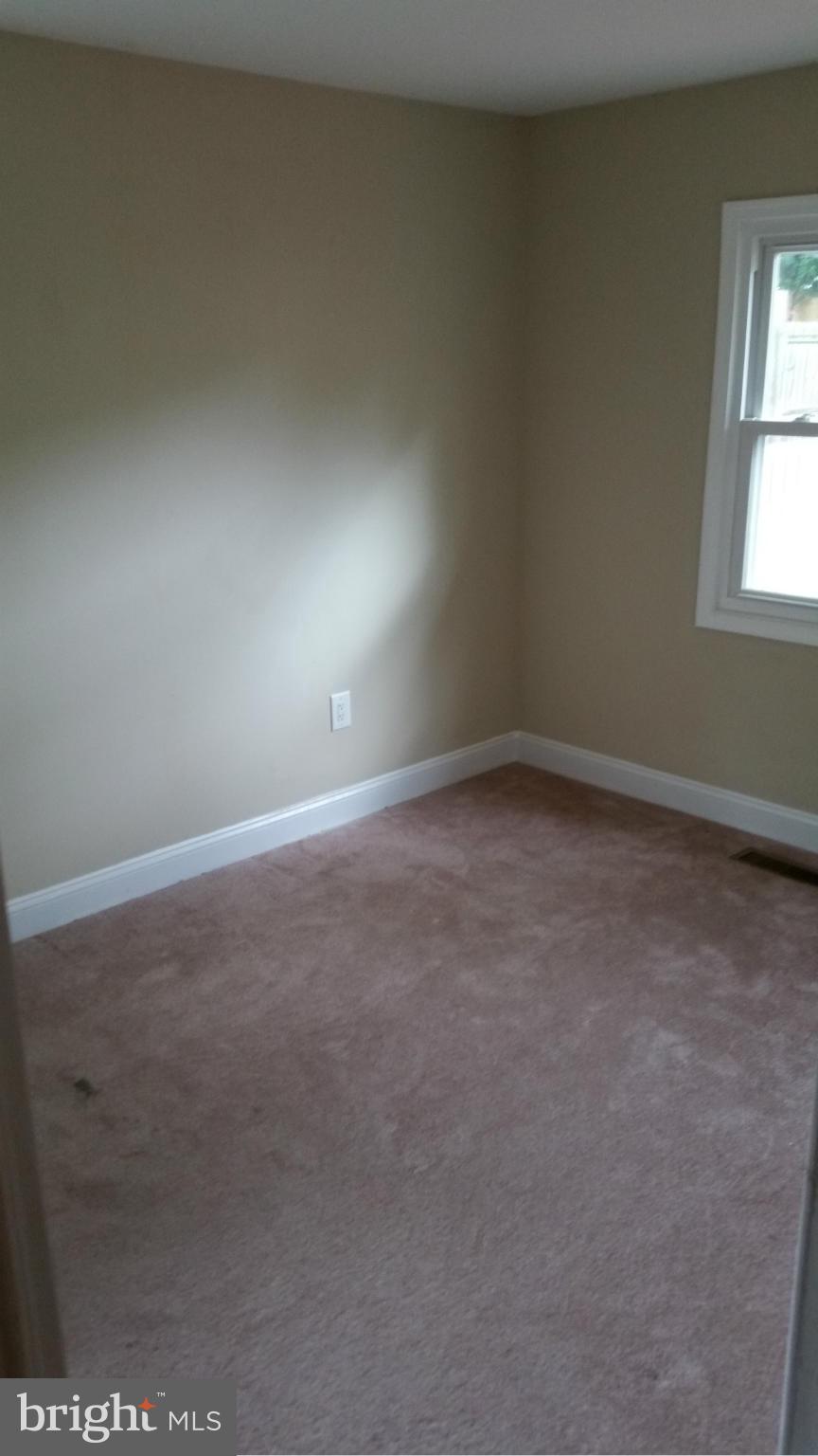 12408 Starlight Lane Bowie, MD 20715 - Photo 25 of 26 an empty room with windows