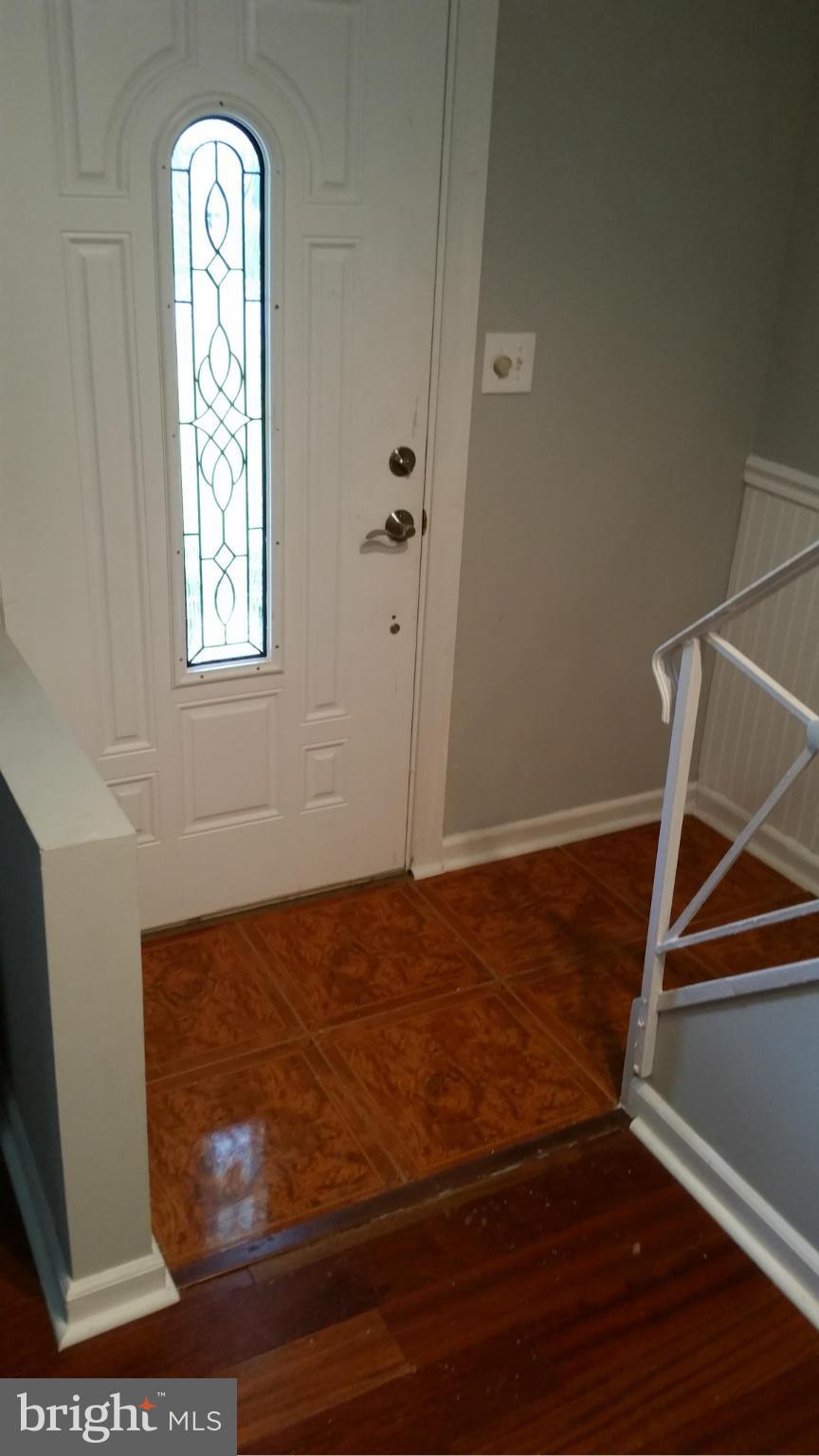 12408 Starlight Lane Bowie, MD 20715 - Photo 26 of 26 a view of entryway with wooden floor