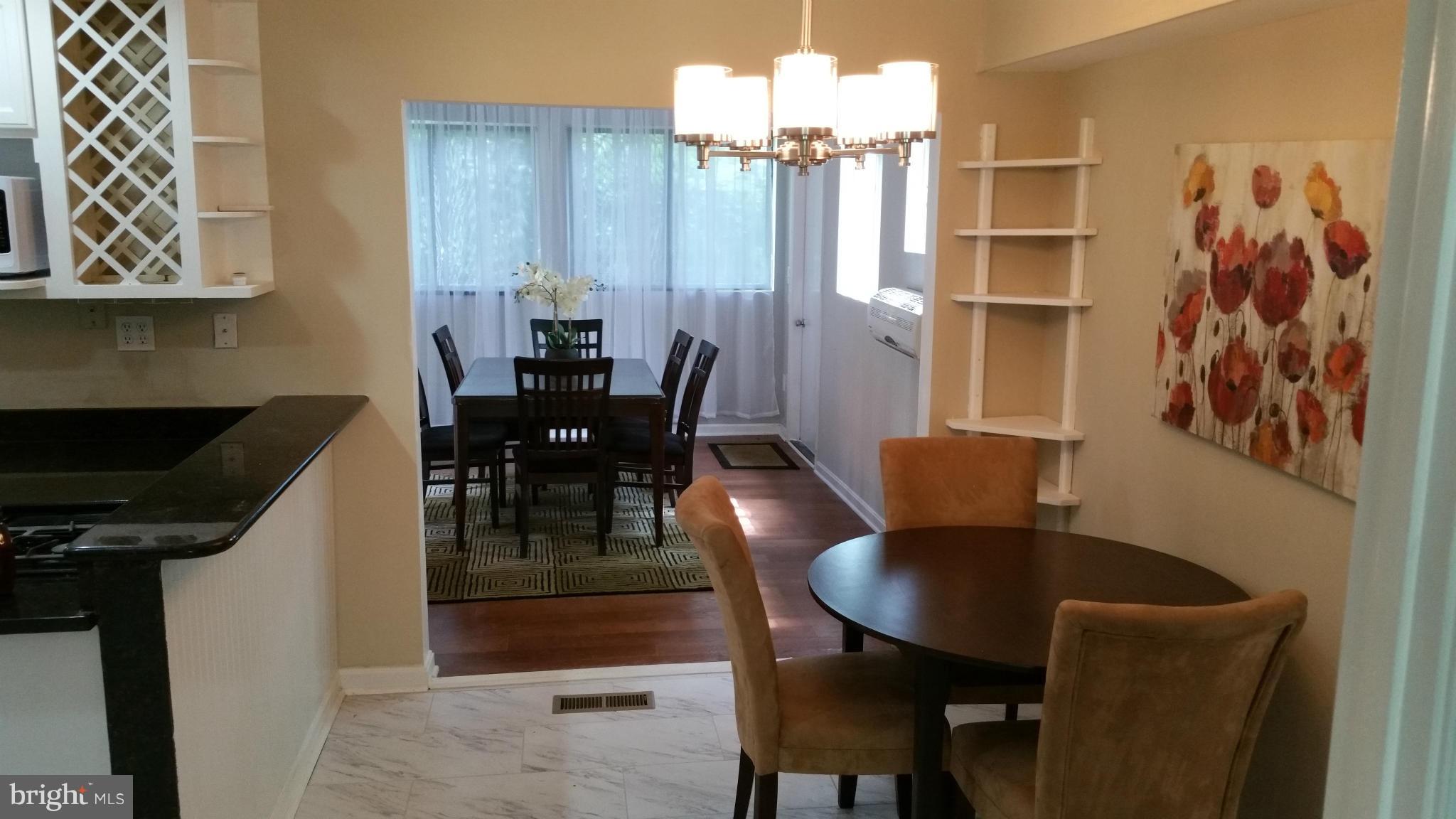 12408 Starlight Lane Bowie, MD 20715 - Photo 7 of 26 a dining room with furniture and window