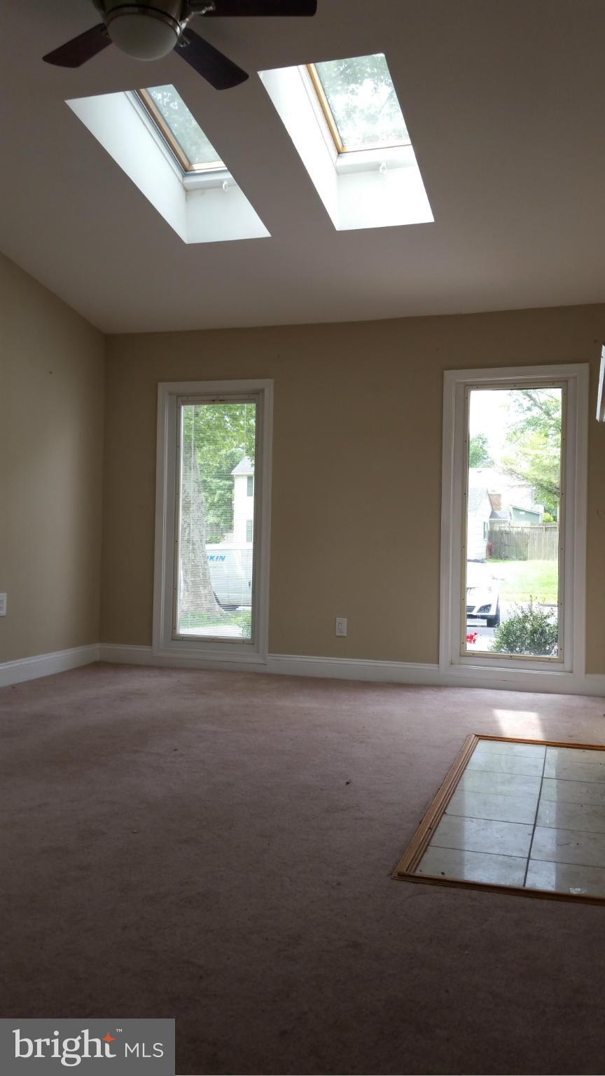 12408 Starlight Lane Bowie, MD 20715 - Photo 9 of 26 an empty room with windows