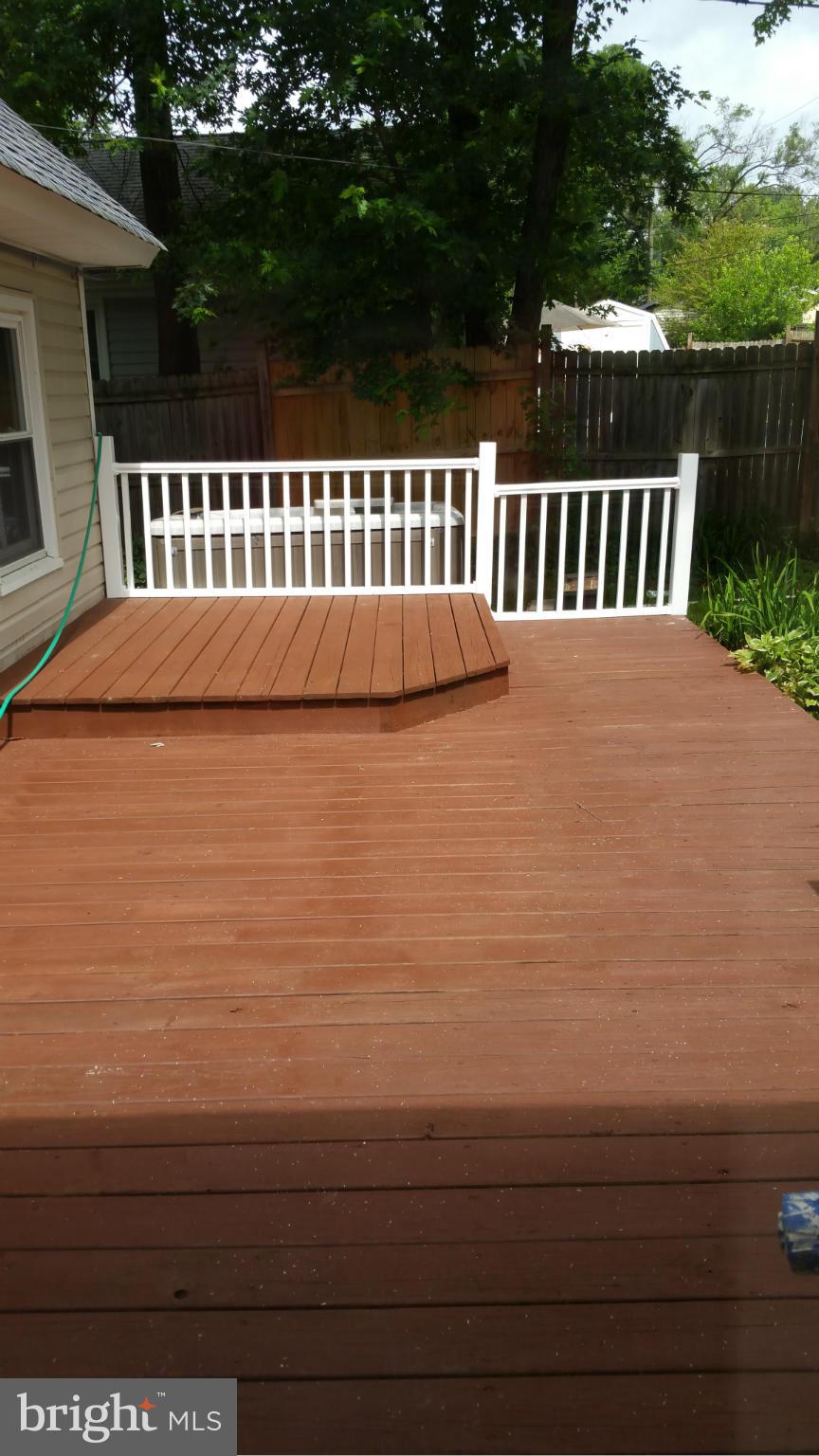 12408 Starlight Lane Bowie, MD 20715 - Photo 10 of 26 a view of outdoor space with deck and yard