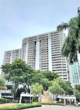 a view of a city with tall buildings