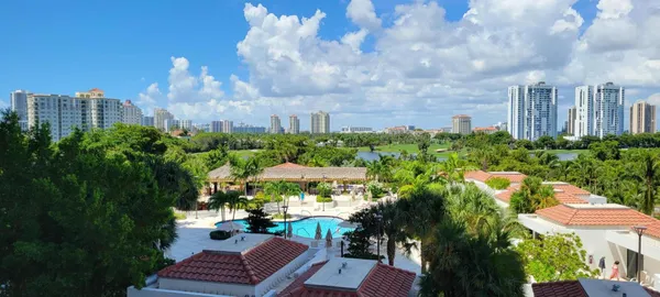 a view of a city with tall buildings