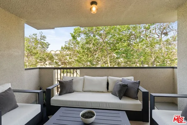 a view of a couch in the roof deck