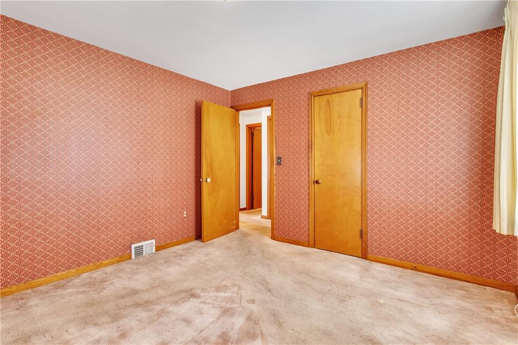 1710 Roosevelt Road Pittsburgh, PA 15237 - Photo 11 of 20 Main floor master bedroom with hardwood floors