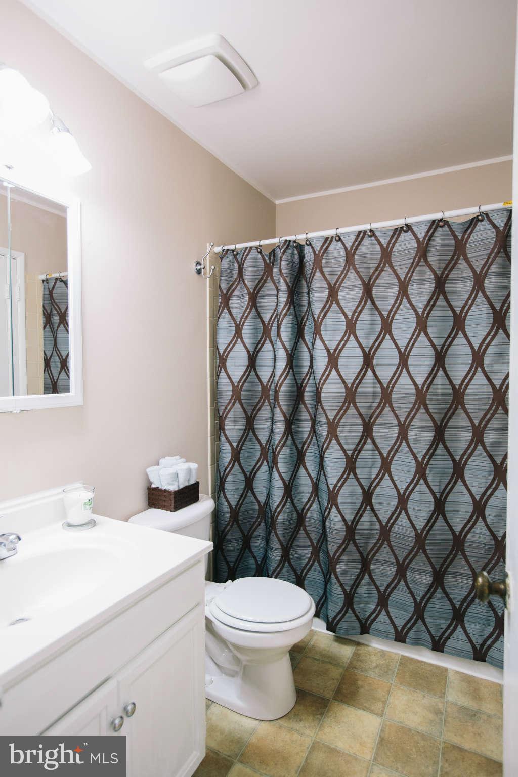 2226 Lofty Heights Place Reston, VA 20191 - Photo 11 of 25 a bathroom with a sink and a toilet