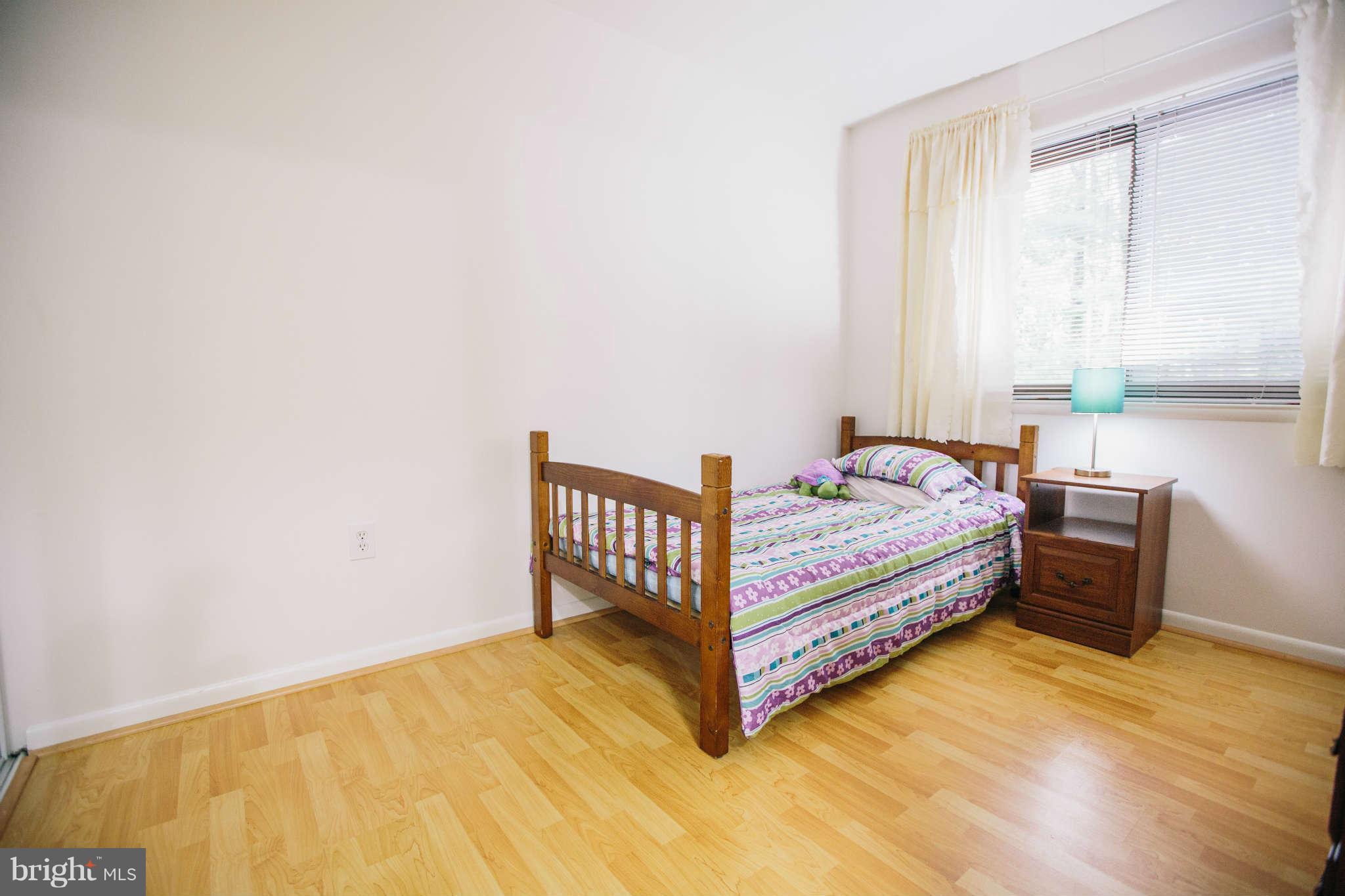 2226 Lofty Heights Place Reston, VA 20191 - Photo 13 of 25 a bedroom with a bed and a window