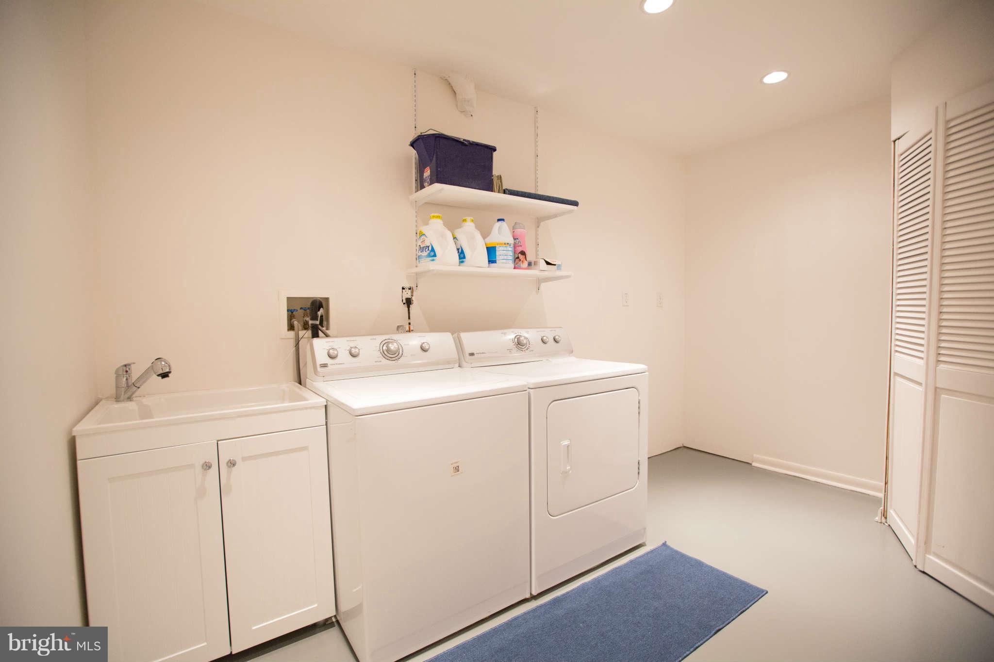 2226 Lofty Heights Place Reston, VA 20191 - Photo 17 of 25 a utility room with dryer and washer
