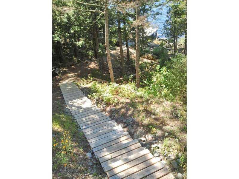 54 Grapevine Brook Road Dover-Foxcroft, ME 04426 - Photo 22 of 30 Waterfront/Dock/Pier. Steps down to...