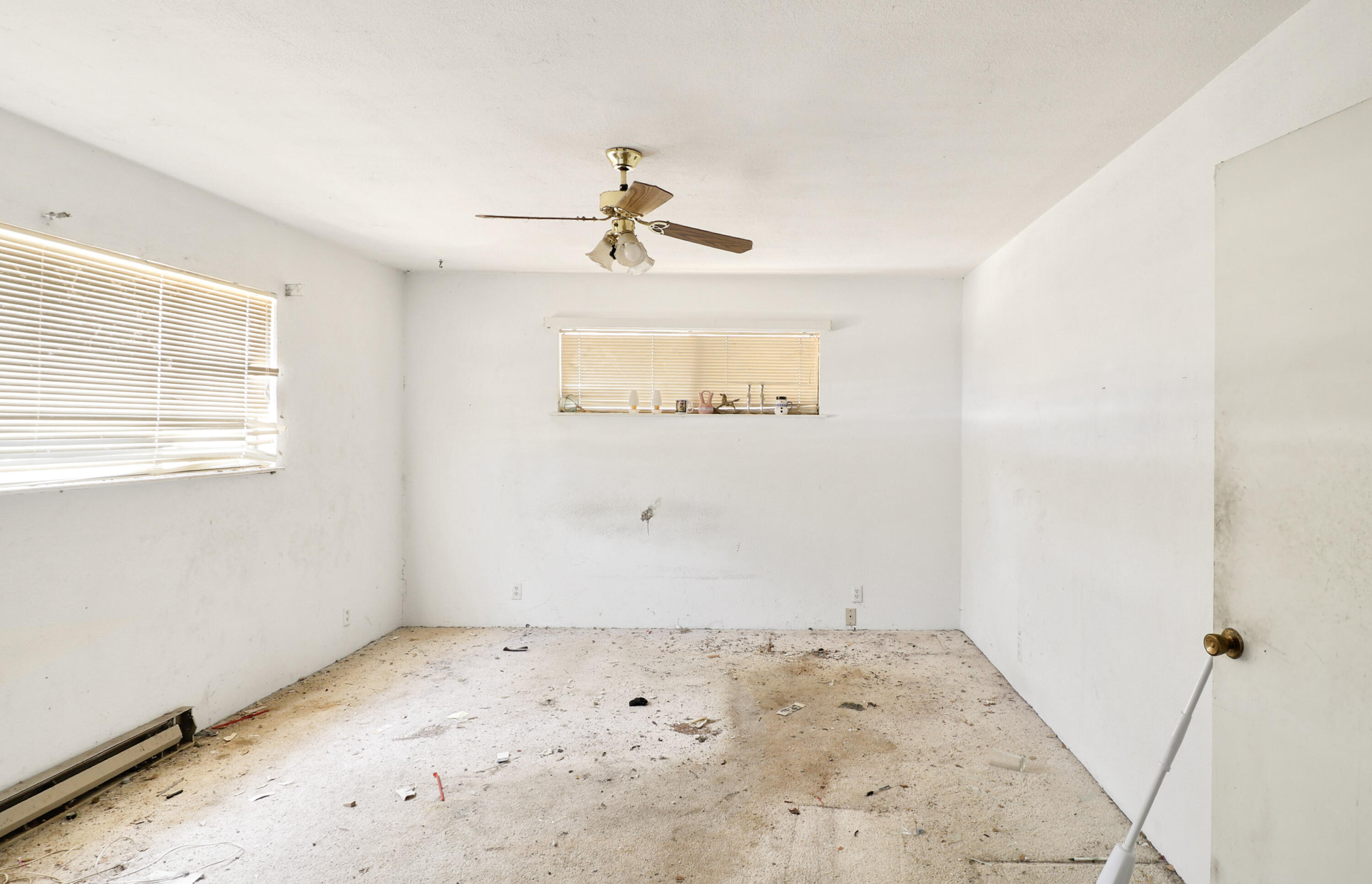 21217 Falling Oaks Road Redding, CA 96003 - Photo 19 of 24 a view of a big room with wooden floor and empty room