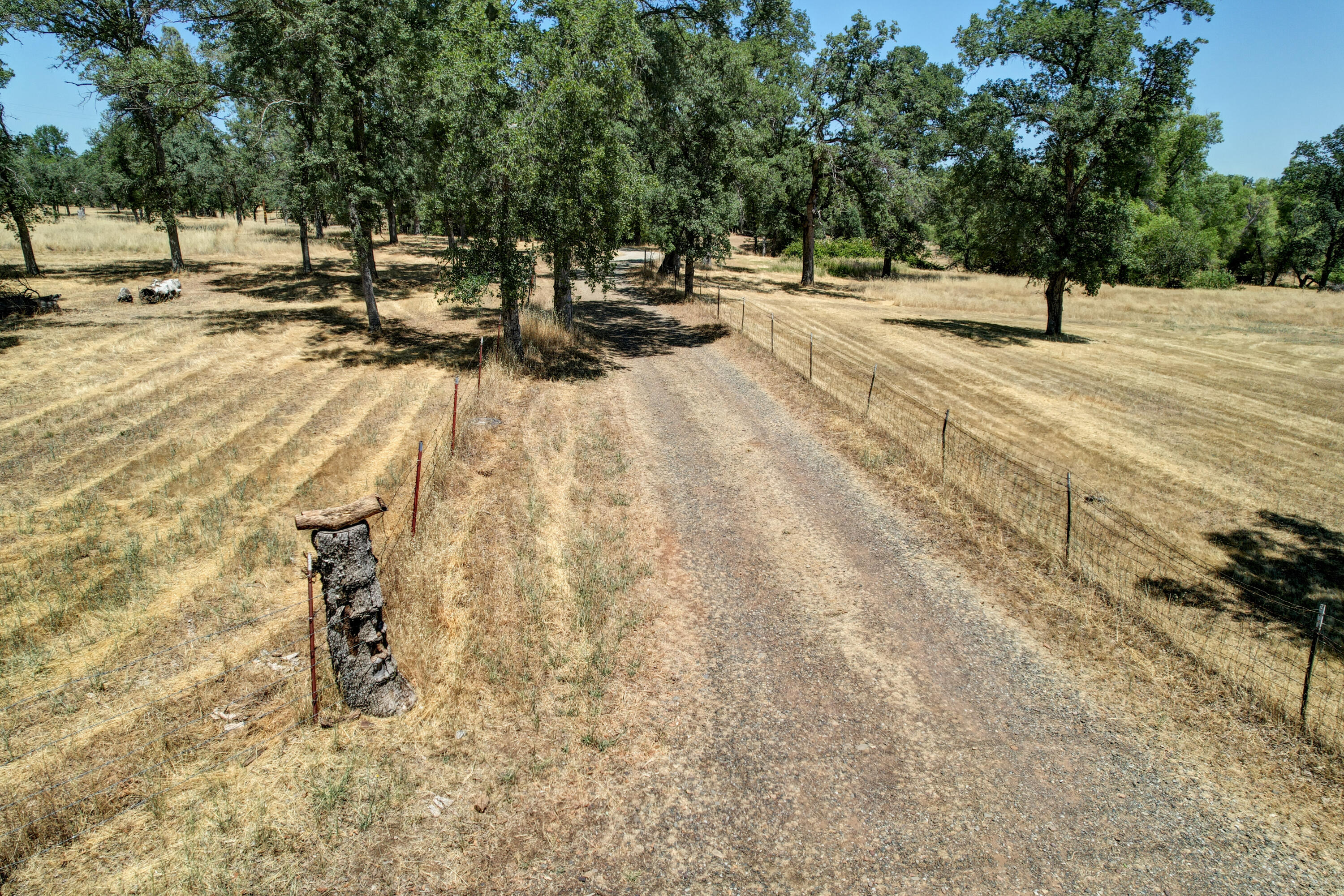 21217 Falling Oaks Road Redding, CA 96003 - Photo 21 of 24 a view of swimming pool with a patio