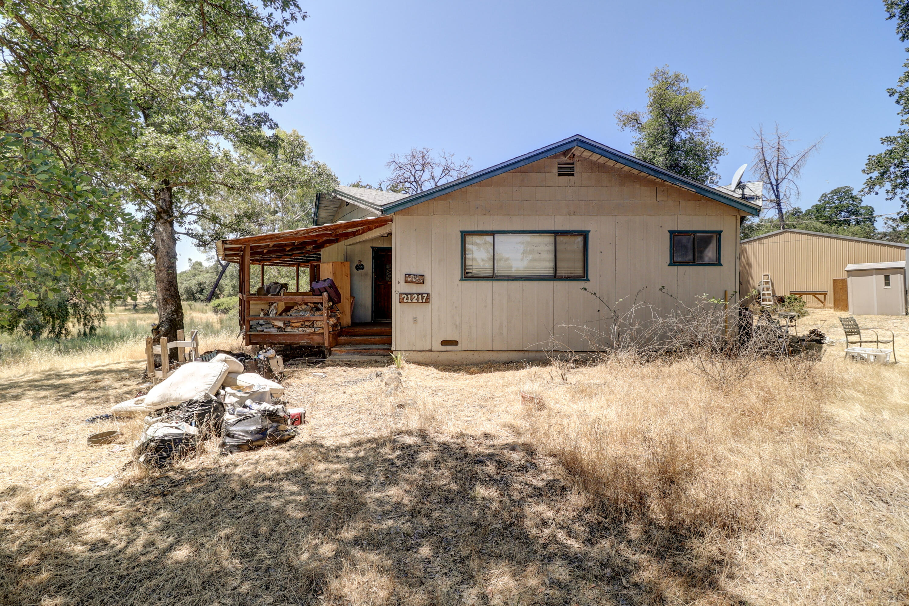 21217 Falling Oaks Road Redding, CA 96003 - Photo 3 of 24 a view of a house covered in snow