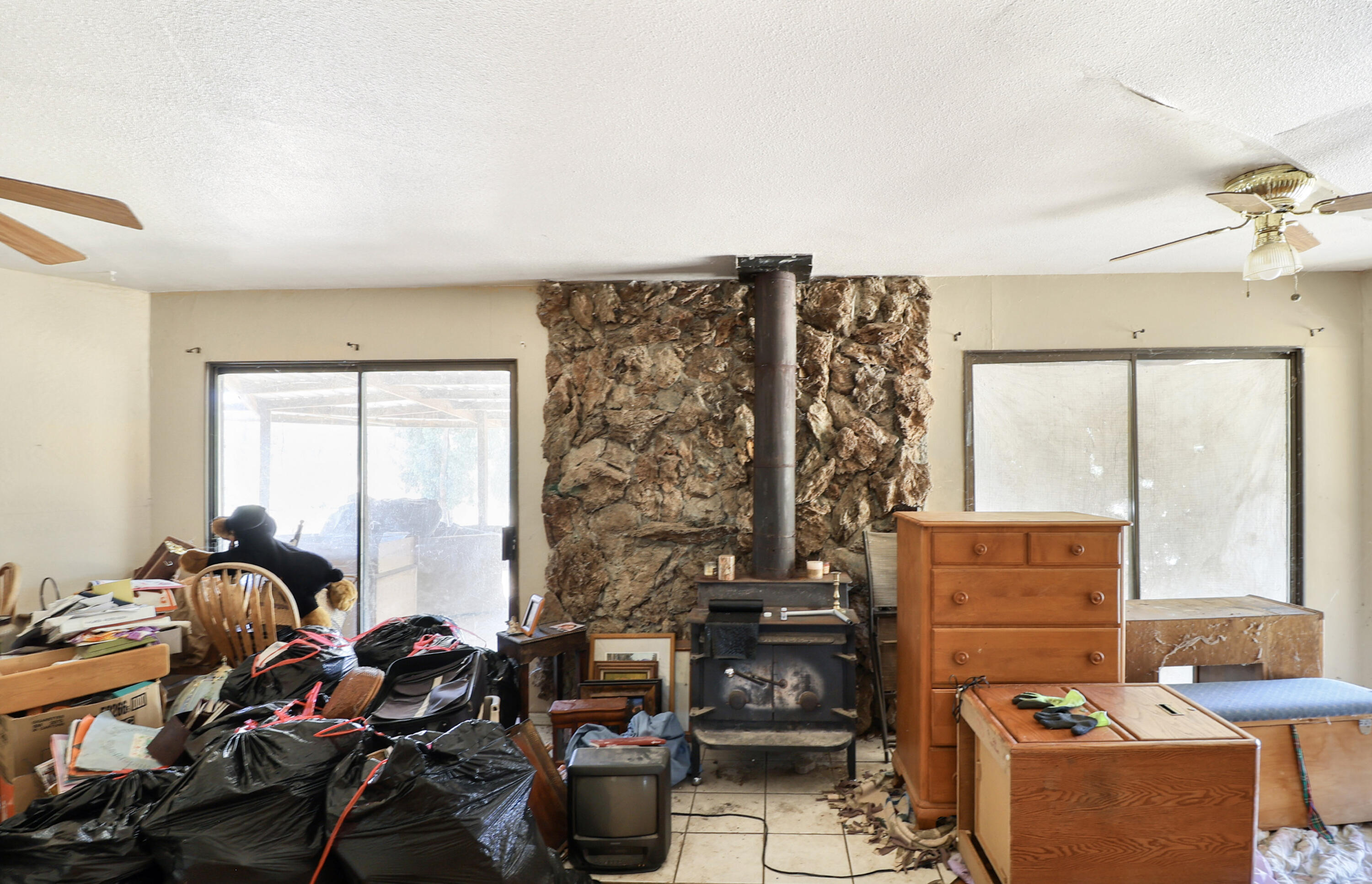 21217 Falling Oaks Road Redding, CA 96003 - Photo 9 of 24 a living room with furniture and a window