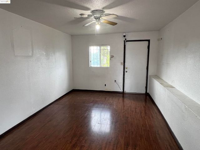 a view of a livingroom with wooden floor