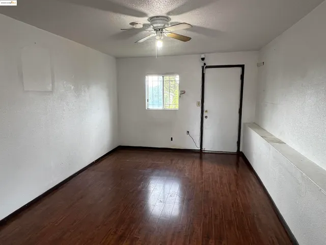 a view of a livingroom with wooden floor
