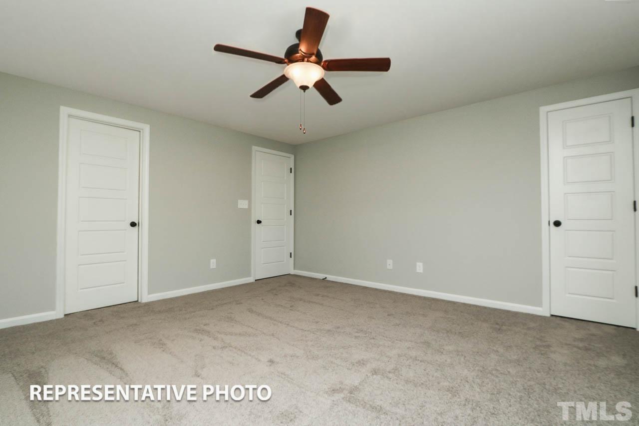 187 East Clydes Point Way Wendell, NC 27591 - Photo 5 of 9 a view of room with a ceiling fan