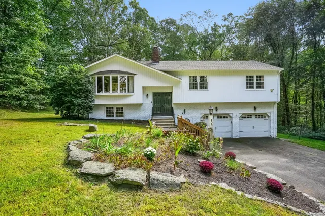 a house view with a outdoor space