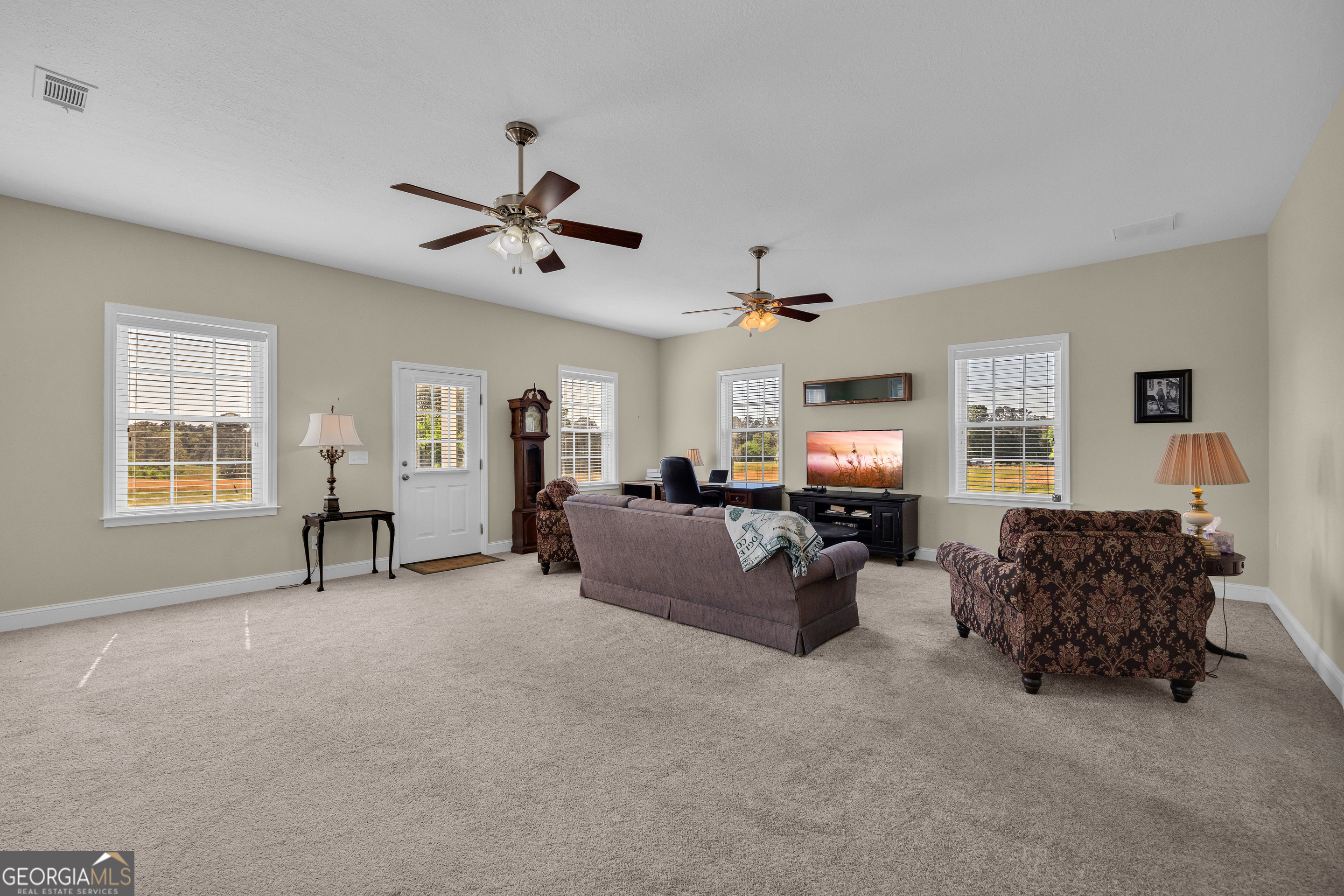 3248 Metasville Road Washington, GA 30673 - Photo 25 of 97 a living room with furniture and a flat screen tv