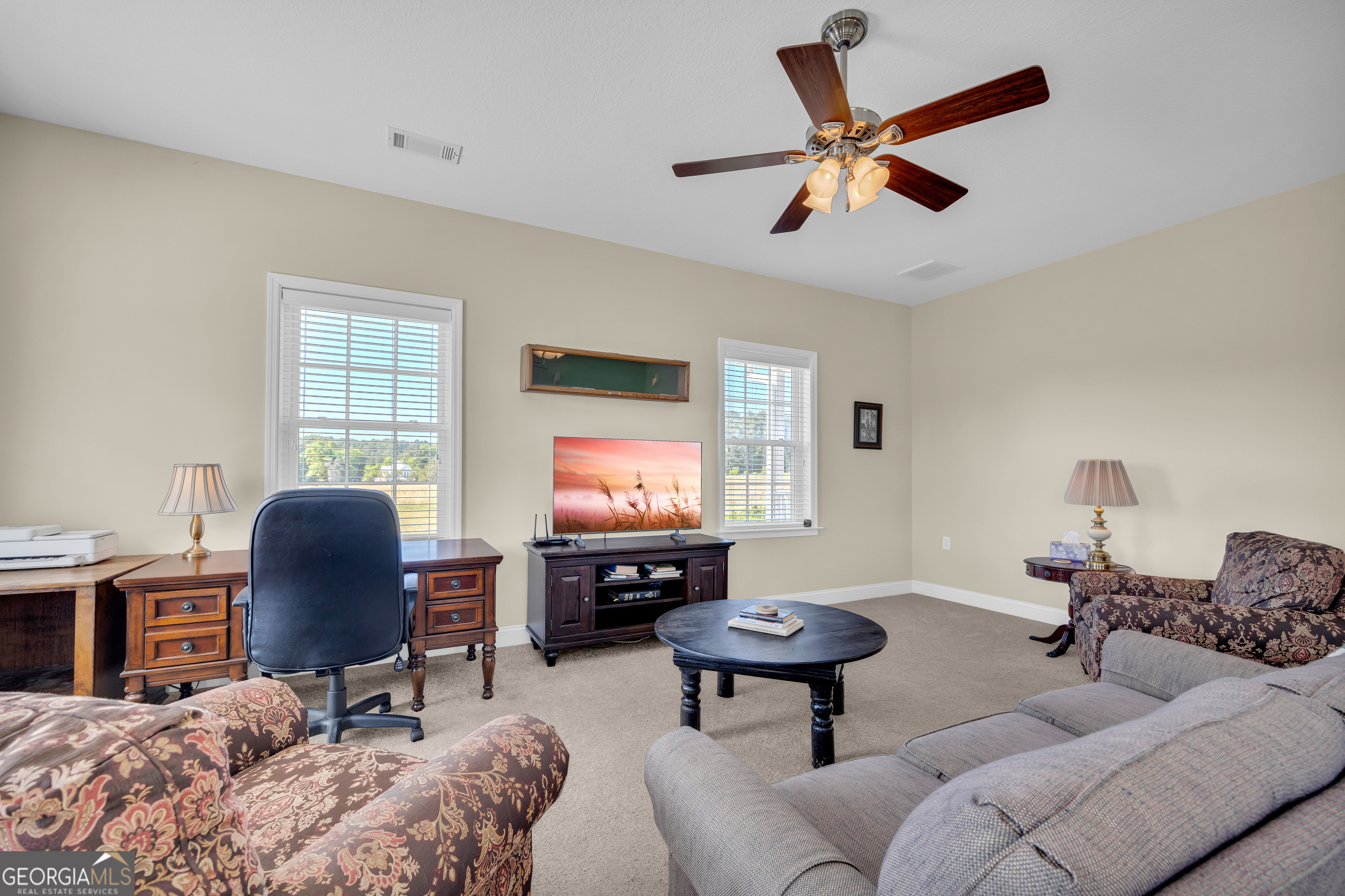 3248 Metasville Road Washington, GA 30673 - Photo 27 of 97 a living room with furniture and a flat screen tv