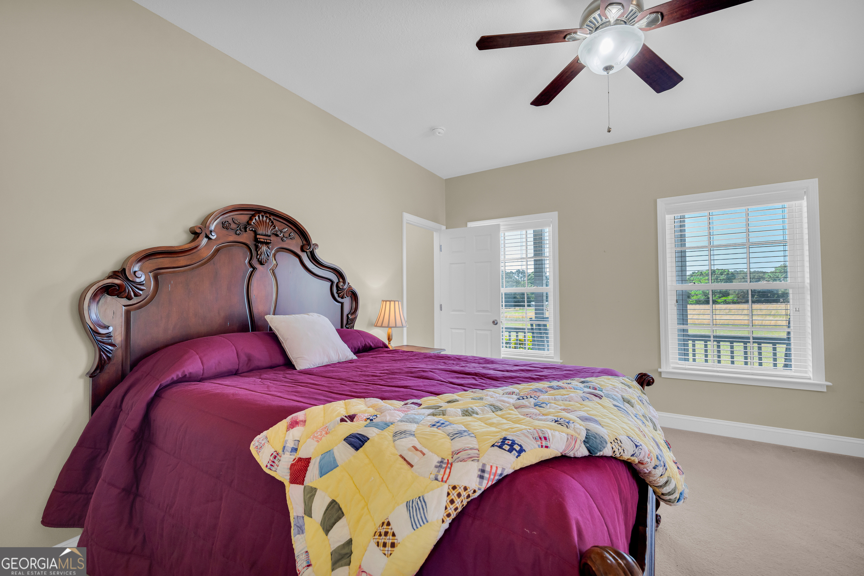 3248 Metasville Road Washington, GA 30673 - Photo 50 of 97 a bed sitting in a bedroom next to a window