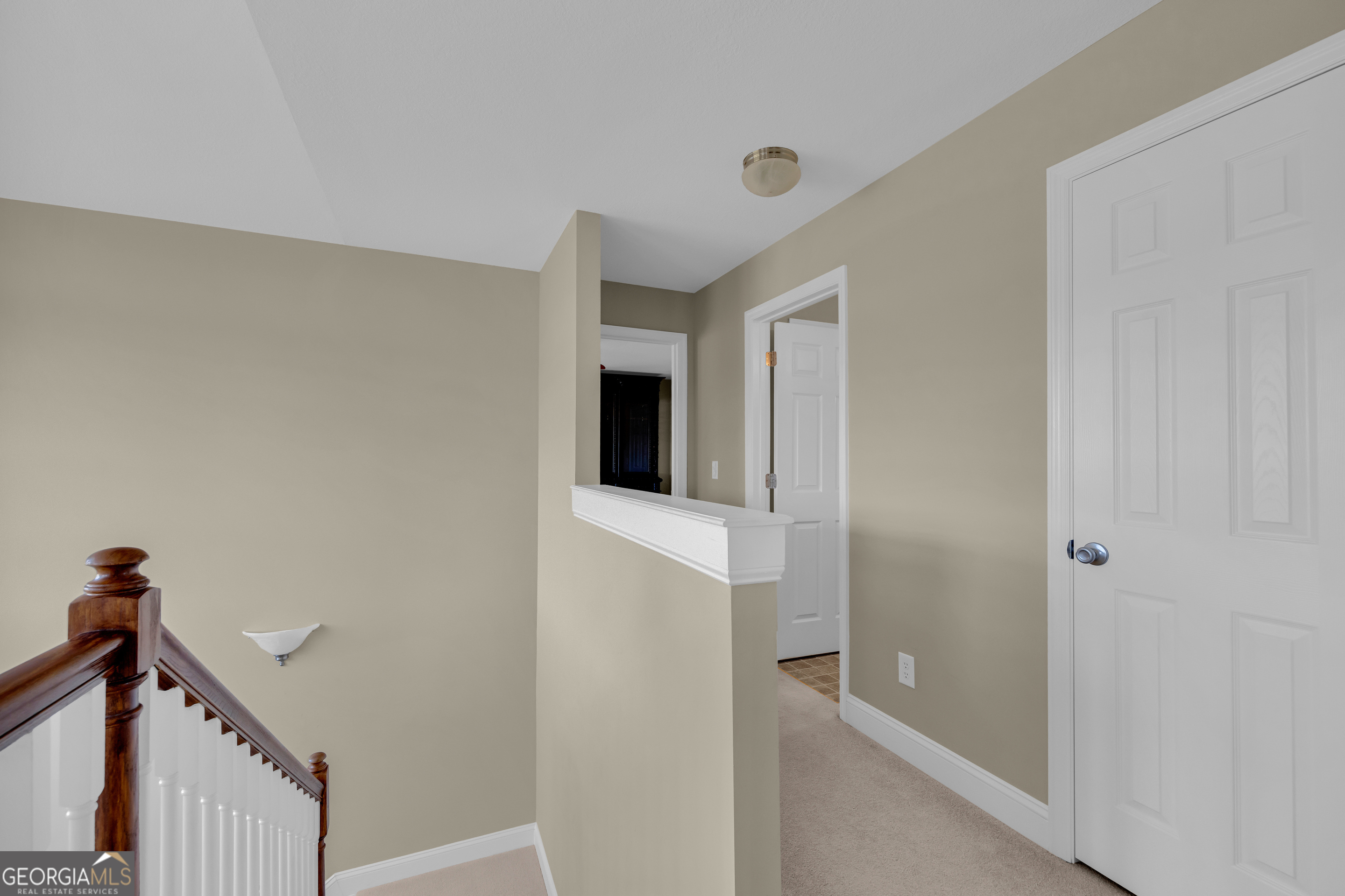 3248 Metasville Road Washington, GA 30673 - Photo 65 of 97 a view of hallway with stairs and wooden floor