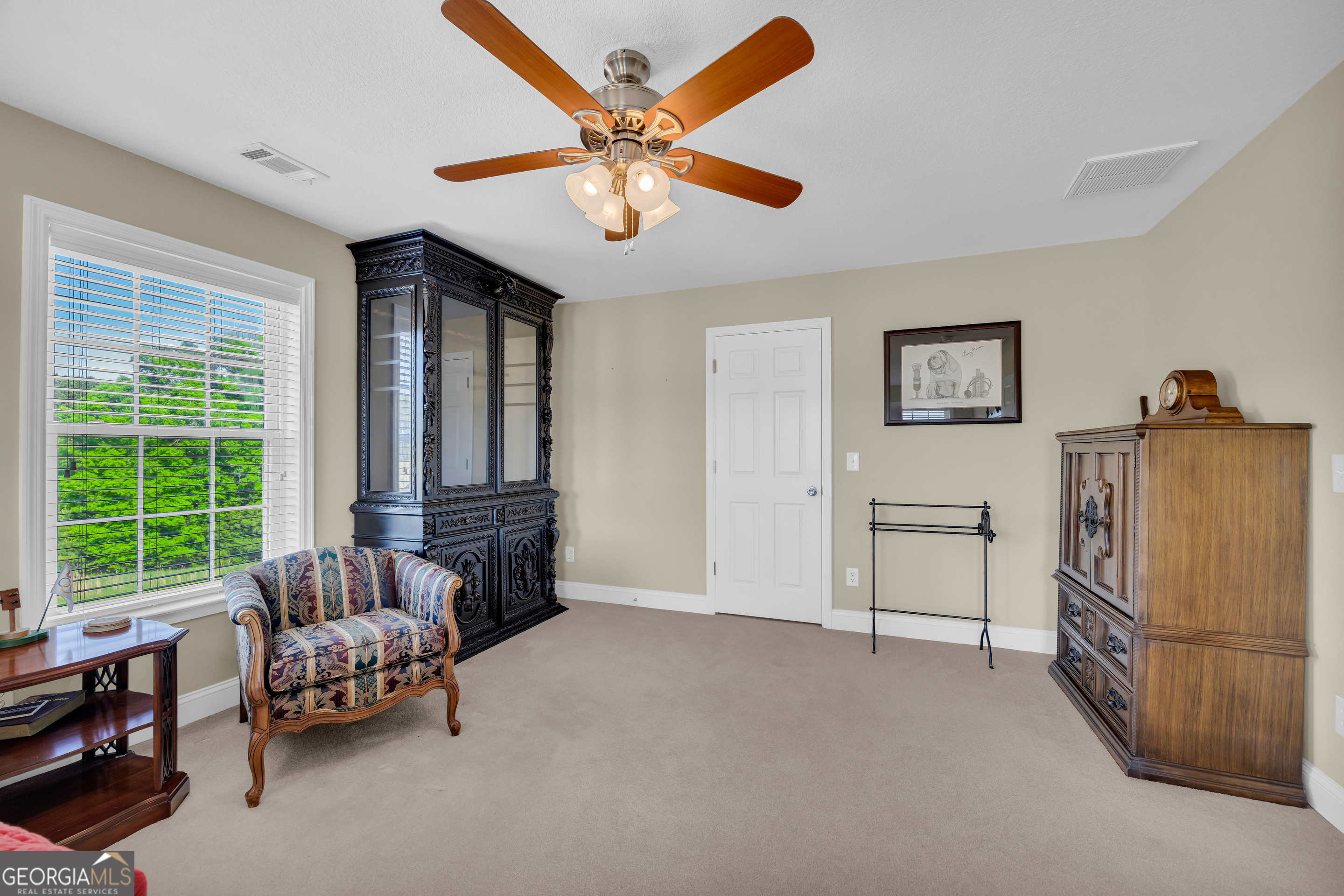 3248 Metasville Road Washington, GA 30673 - Photo 68 of 97 a living room with furniture and a large window with kitchen view