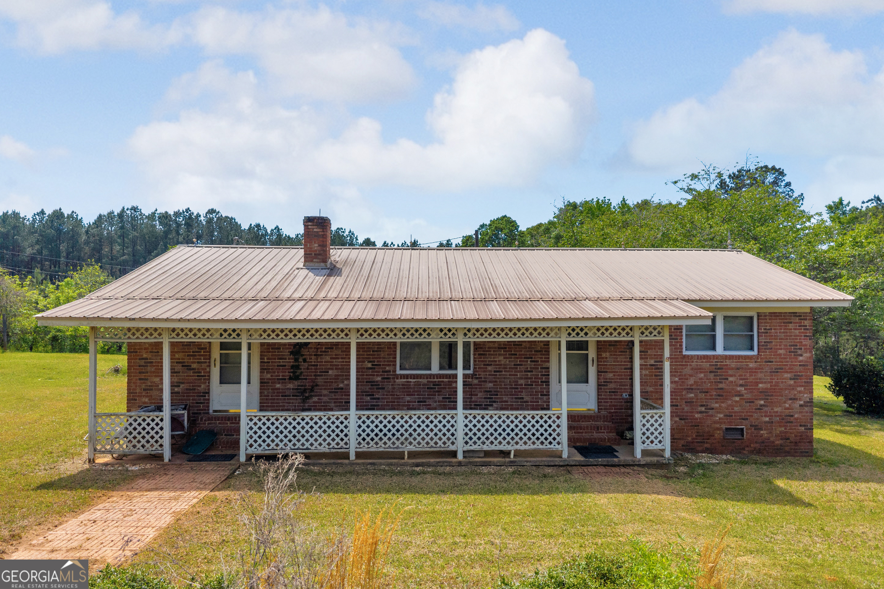 3248 Metasville Road Washington, GA 30673 - Photo 89 of 97 a view of a house with a garden and yard