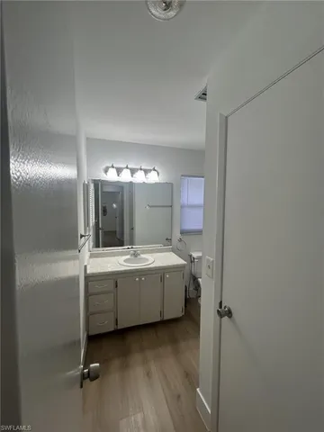 a bathroom with a tub and shower
