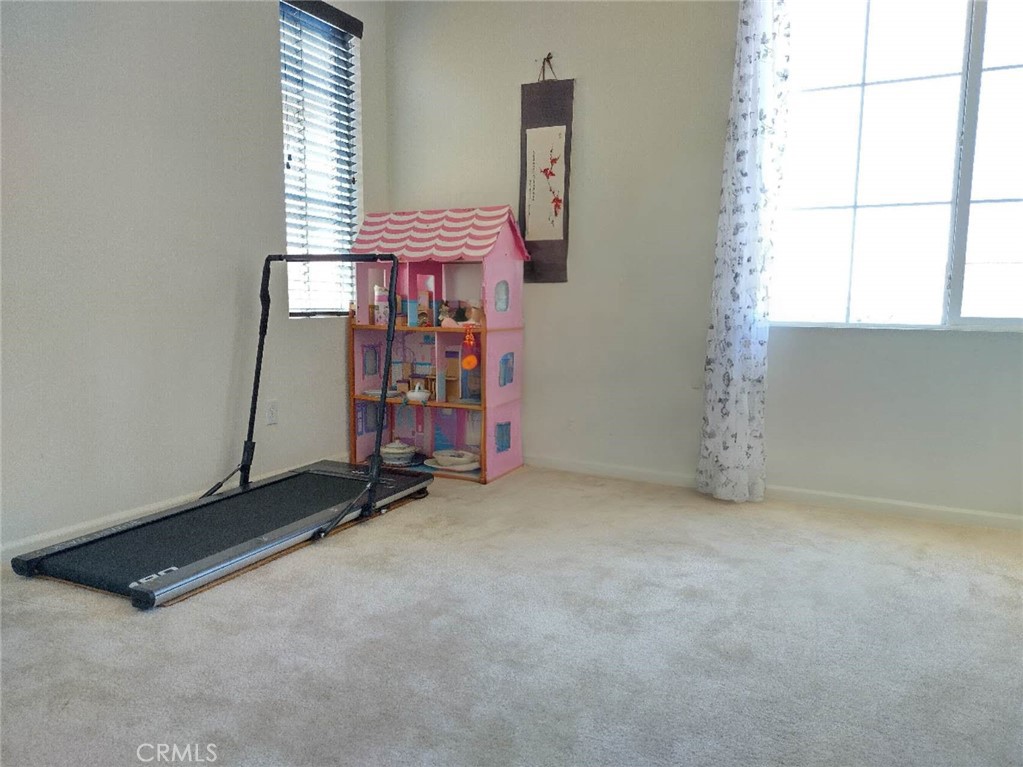 11811 Cramer Road Yucaipa, CA 92399 - Photo 40 of 56 an empty room with windows