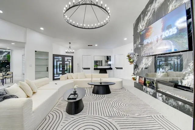 a bedroom with a bed and a night stand