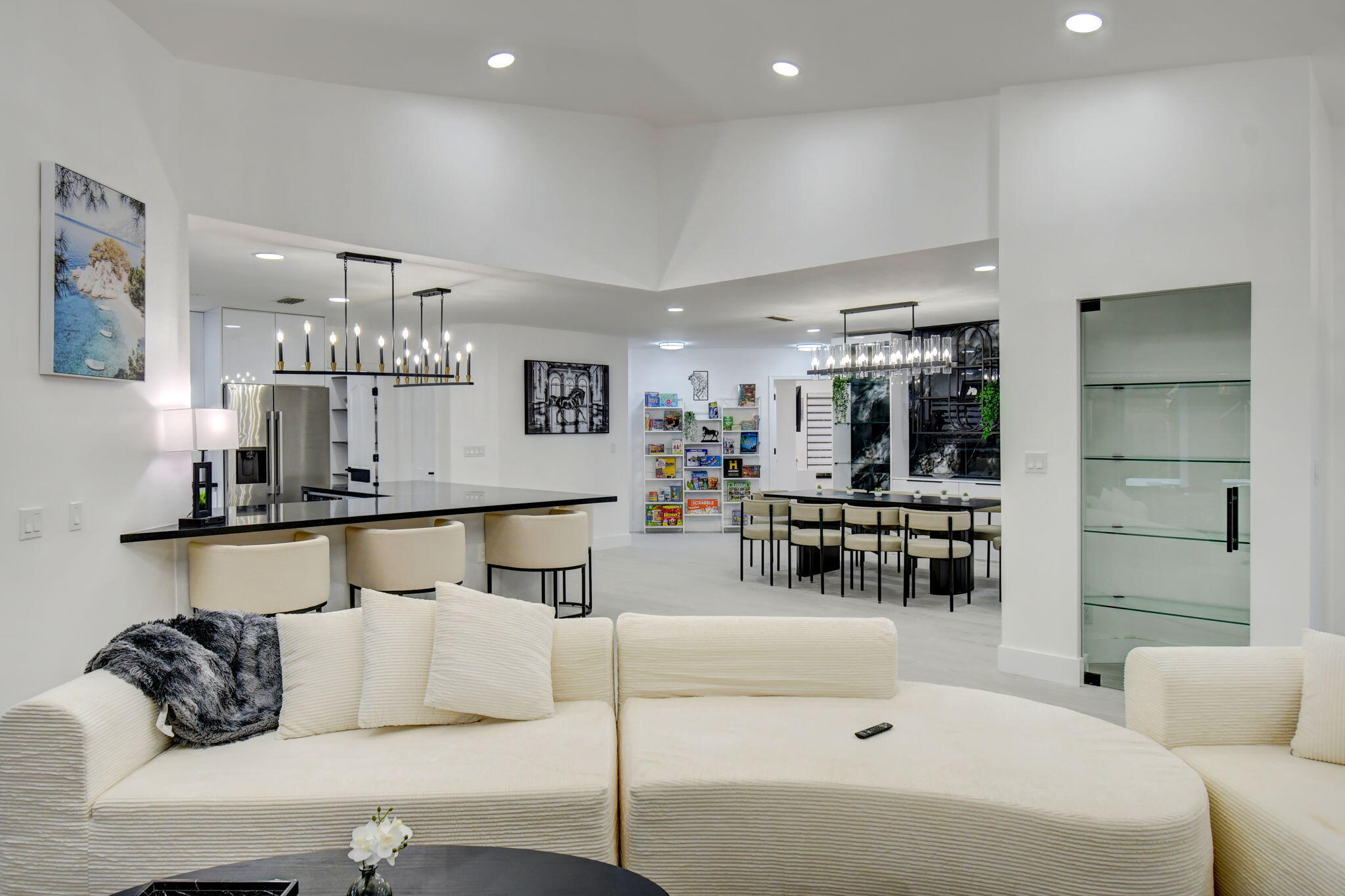 13302 Doubletree Circle Wellington, FL 33414 - Photo 18 of 82 a living room with furniture and a dining table with kitchen view