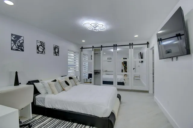 a view of a swimming pool with a patio