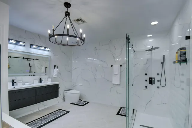 a aerial view of a house with a yard and garden